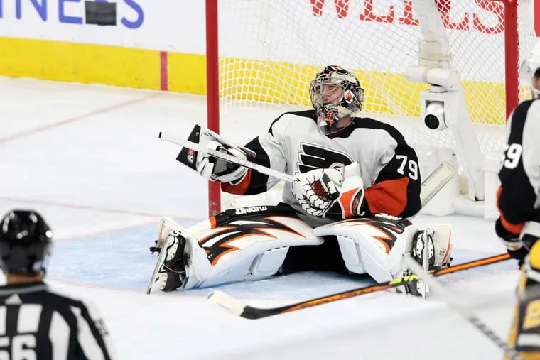 Flyers goalie Carter Hart reacts after the Penguins' first goal of the game in the first period.
