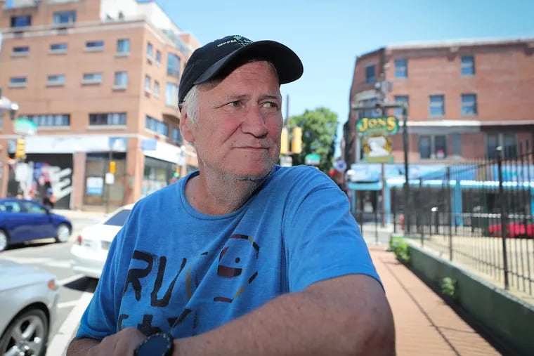 Rusty Crowell near the scene of Saturday night’s shooting on South Street. Crowell, who was shot in the back of the leg, returned to the scene and had lunch at a nearby bar.