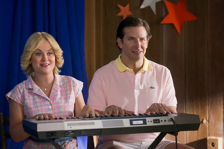 Amy Poehler and Bradley Cooper in the Netflix original series Wet Hot American Summer: First Day Of Camp. (Photo by Saeed Adyani / Netflix)