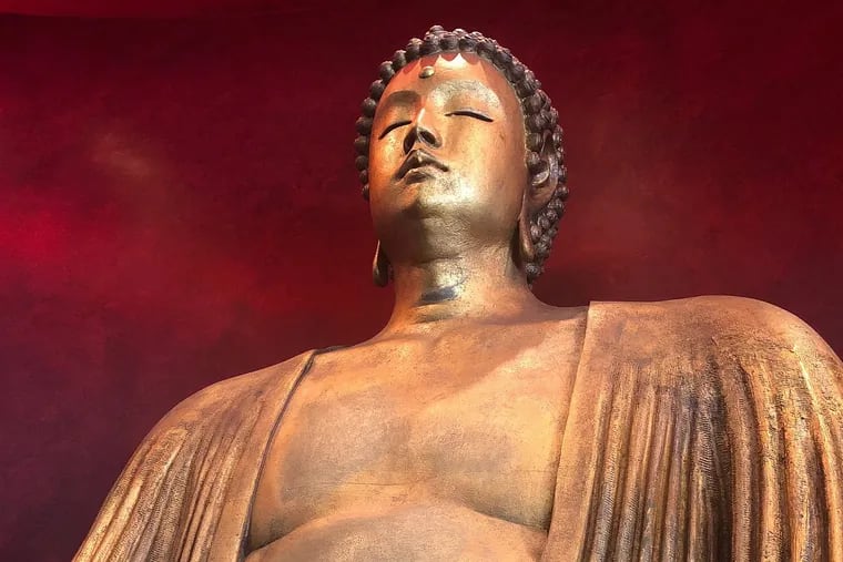 The signature Buddha at Buddakan. The Buddha itself is 7 feet tall and sits on a 4-foot pedestal.