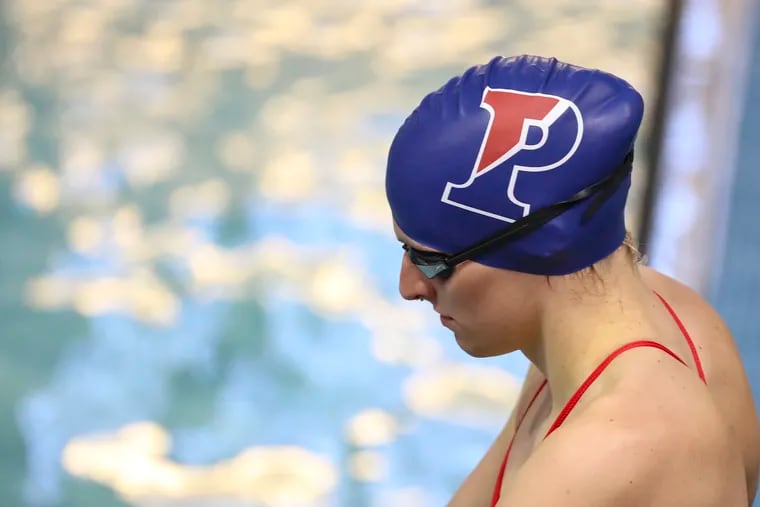 Penn swimmer Lia Thomas warms up before a swim meet at Penn's Sheerr Pool on Jan. 8. Thomas is a transgender athlete who is among the nation's top swimmers in her events.