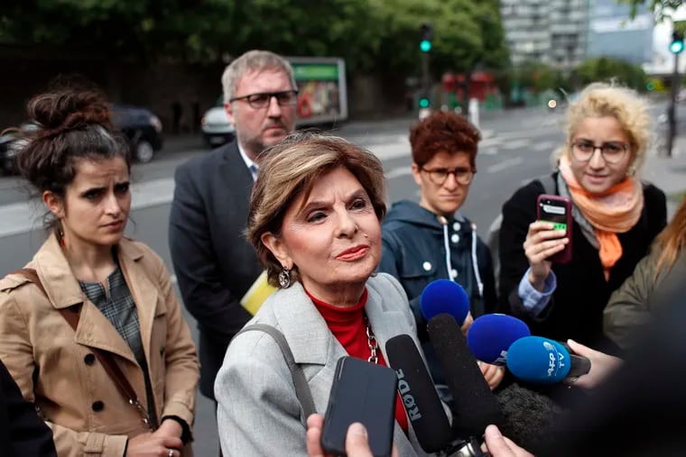 American lawyer Gloria Allred, center, gives a press conference, in Paris, Tuesday, May 28, 2019. The lawyer for a woman who filed a rape complaint in Paris against Chris Brown says the American rap artist "has thumbed his nose at and shown disrespect for the French legal system" after he did not attend a confrontation with the alleged victim Tuesday.