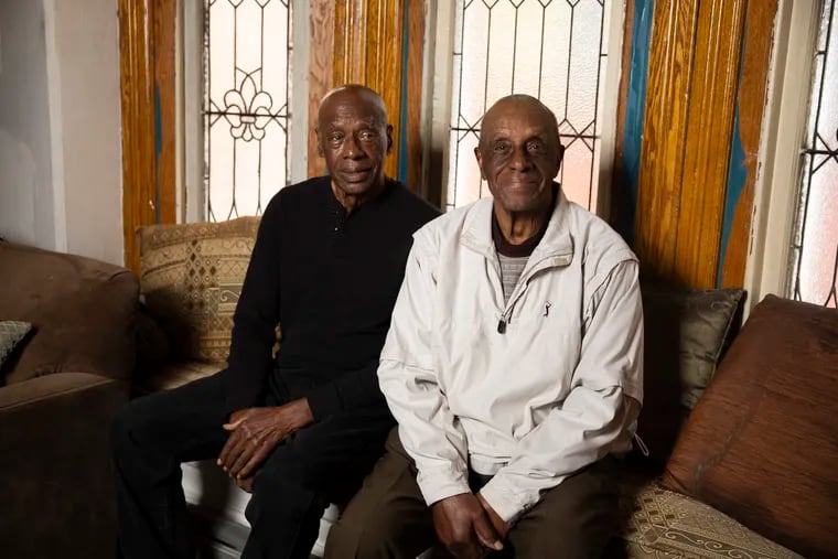 Brothers Lou and Arlington Henderson posed for a portrait at Arlington’s home in West Philadelphia on Thursday, May 16, 2024.  They are among a few  dozen elderly Black ballplayers who will be honored June 20 at the MLB Negro Leagues tribute game at Rickwood Field in Birmingham, Ala.
