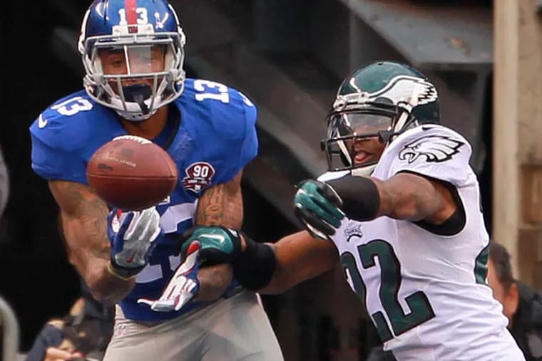 Brandon Boykin knocks the ball away from Odell Beckham Jr. in the end zone. (Ron Cortes/Staff Photographer)