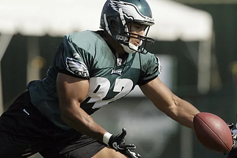 Eagles' tight end Clay Harbor tries to catch a pass during training camp. (Yong Kim / Staff Photographer)