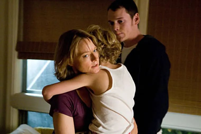 Jodie Foster with Riley Thomas Stewart (center) and Anton Yelchin in "The Beaver."