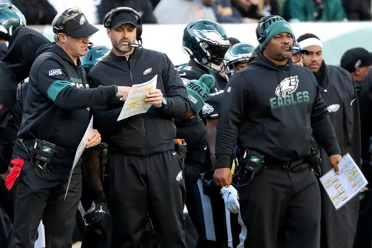 Eagles head coach Doug Pederson (left) and offensive coordinator Mike Groh aren't surprising as many opponents with their play-calling as they once did.