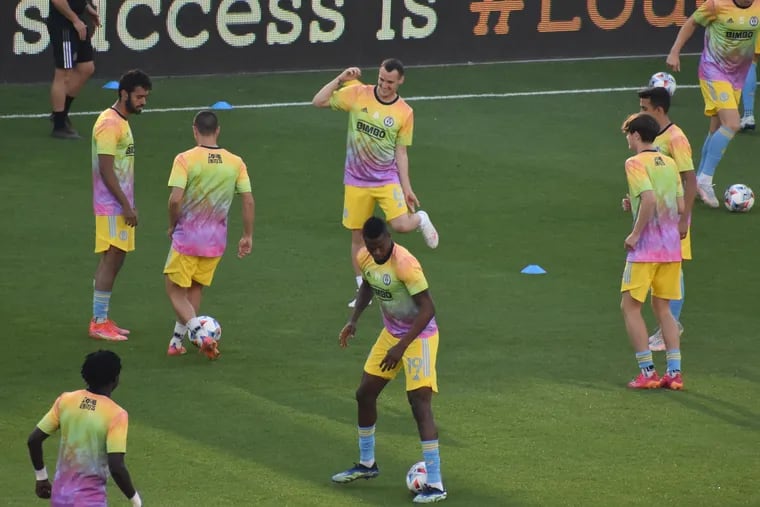Dániel Gazdag (center rear) smiles during warmups with his teammates before the Union's win at D.C. United on Sunday.