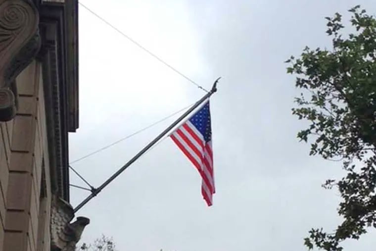 The torn and tattered flags flying at 2100 Parkway Apartments, which Moore College of Art & Design professor Lorie Surnitsky has been trying to get replaced since February, were switched out for new flags on Thursday afternoon.