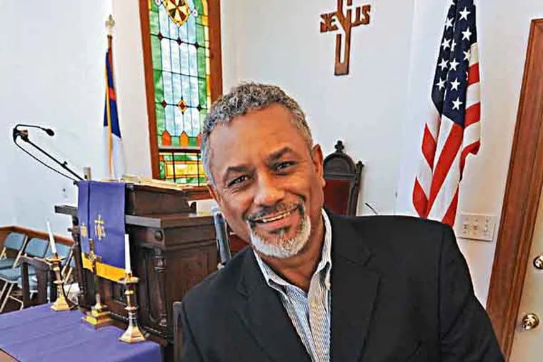 At Jacob's Chapel and the Colemantown Meeting House in Mount Laurel, the Rev. Terrell Person and historian Paul Schopp on March 12, 2013.  Here, Rev. Person in the chapel.  ( APRIL SAUL / Staff )