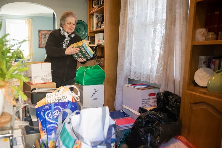 Raelyn Harman, surrounded by donated school supplies inside her Havertown, Pa., home. She has formed Teachers Teammates to connect needy children with the basic learning tools many lack in classrooms and, this year, at home due to the pandemic.