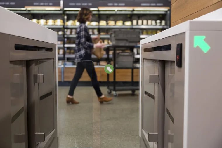 A turnstile entrance to an Amazon Go store in Seattle. Plans for an Amazon Go store in Philadelphia may be affected by the recent ban on cashless stores.