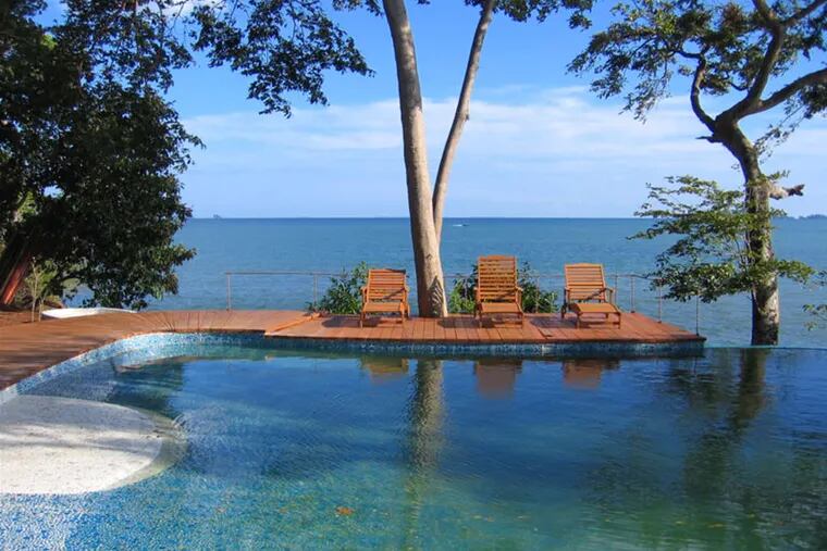 The infinity pool at Cala Mia hotel, with a view of the Gulf of Chiriqui on Panama's Pacific Ocean side. The hotel, on the island of Boca Brava, has 11 thatched-roof bungalows.