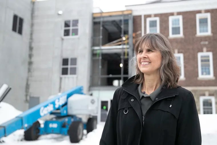 Susan Springsteen of nth Solutions outside of an old steel mill building that is will house the nth Innovation Center at 190 W. Lincoln Highway in Coatesville, Pa. on Tuesday, Feb. 23, 2021. Several start-up companies will move into the building, and take advantage of Keystone Innovation Zone tax credits.