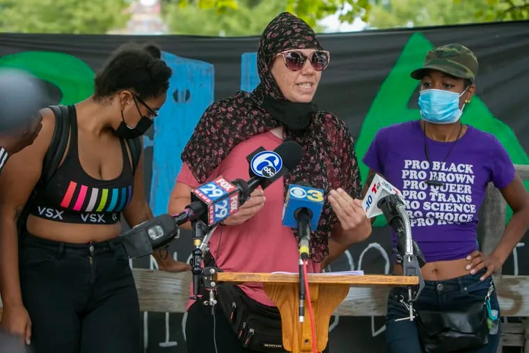 Jennifer Bennetch with Occupy PHA during a presser at Sharswood encampment. Activists, supporters, and representatives of the homeless encampment at 21st and Ridge next to Philadelphia Housing Authority offices held a press conference asking for Mayor Jim Kenney to visit the camps.