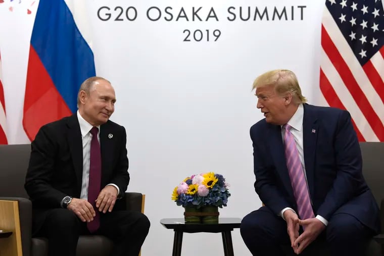 President Donald Trump (right) meets with Russian President Vladimir Putin at the G-20 summit in Osaka, Japan, in June. The complicated relationship between the U.S. and the then-Soviet Union took center stage in Philadelphia 60 years ago, in a track meet at Franklin Field.