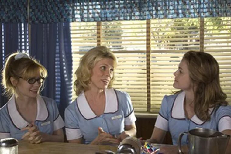 Writer-director Adrienne Shelly (left) costars as Dawn with Cheryl Hines (center) as Becky and Keri Russell as Jenna, whose misery in a bad marriage comes to a head when she becomes pregnant.