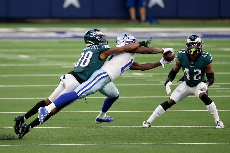 Dallas Cowboys wide receiver Michael Gallup (13) makes a catch in front of Eagles cornerback Michael Jacquet (38) in the first quarter of Sunday's game. The Eagles lost 37-17.
