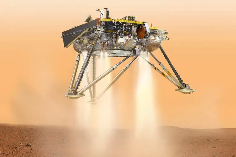 This illustration made available by NASA in October 2016 shows an illustration of NASA's InSight lander about to land on the surface of Mars.