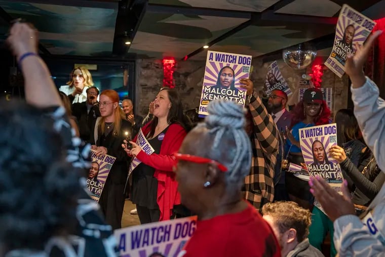 Supporters of State Rep. Malcolm Kenyatta react as results of his his victory in his Democratic primary election for auditor general are announced during a party at the Divine Lorraine Hotel.
