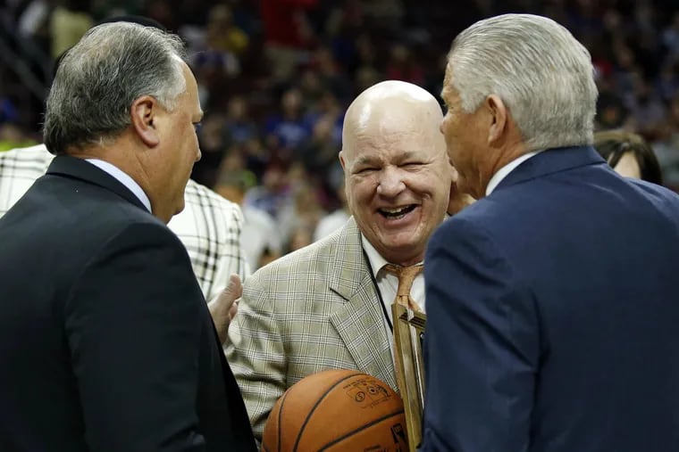 Longtime NBA referee Joey Crawford (center) was honored during Sixers-Bucks game on  Sunday.