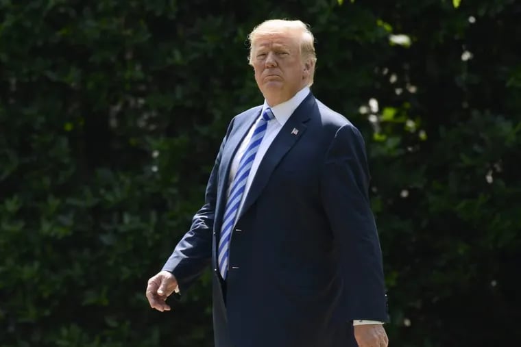 In this June 1, 2018, photo, President Donald Trump walks to Marine One on the South Lawn of the White House in Washington, as he heads to Camp David for the weekend.