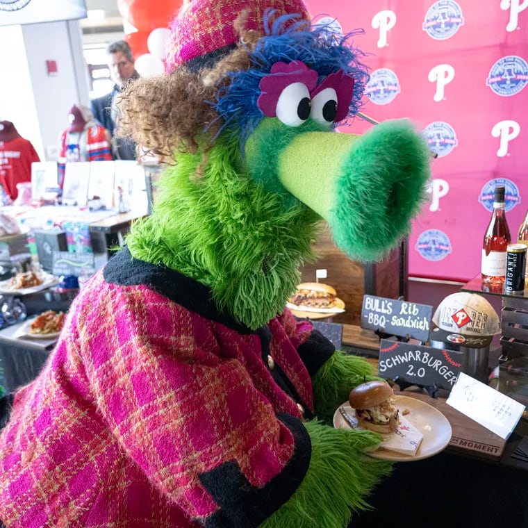 Phoebe Phanatic walks away with the SchwarBurger minutes after a preview of this year's new foods and features to the stadium.