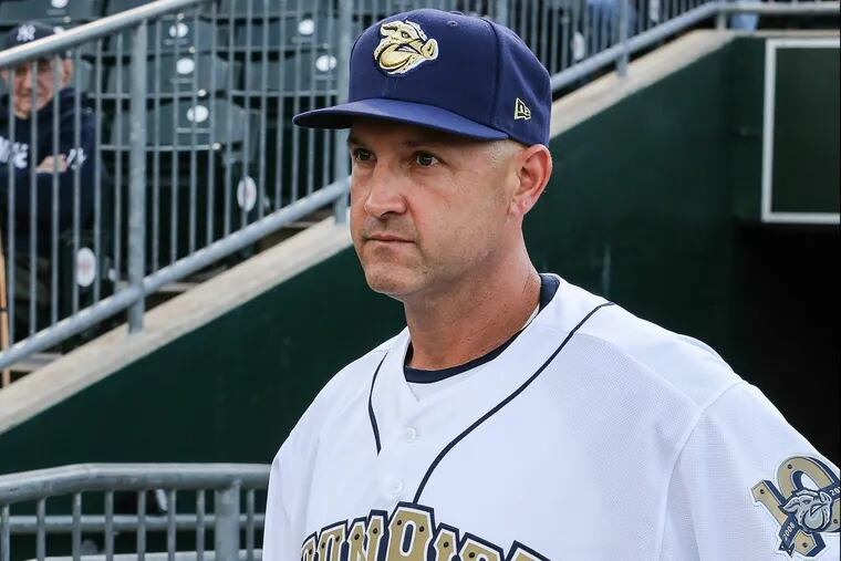 After 10 years managing in the Phillies minor-league system, Dusty Wathan appears to be a finalist for the big-league job.