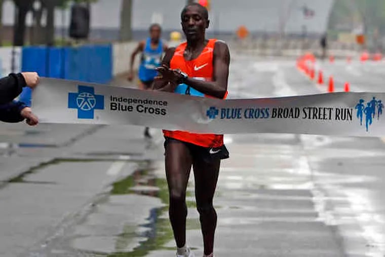 Newcomer Linus Maiyo (above) was 2009's top finisher, crossing the line in 47:21. Jane Murage (below) was the top female runner for the second straight year, finishing in 53:31.
