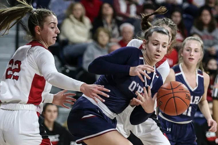 O'Hara's Molly Rullo eye the loose ball during the first quarter of the Catholic League Championship game at the Palestra on Feb. 28, 2022. O'Hara beat Archbishop Carroll 55-30 to win the championship.