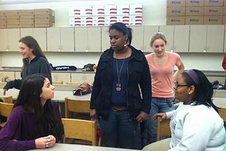 Getting to know one another at Harriton High are (standing, from left) Cat Dolan, TiJuana Jackson, and Carlie Ladda and (seated from left) Ilissa Kaye and Erica Irving. (KRISTEN GRAHAM / Inquirer Staff)