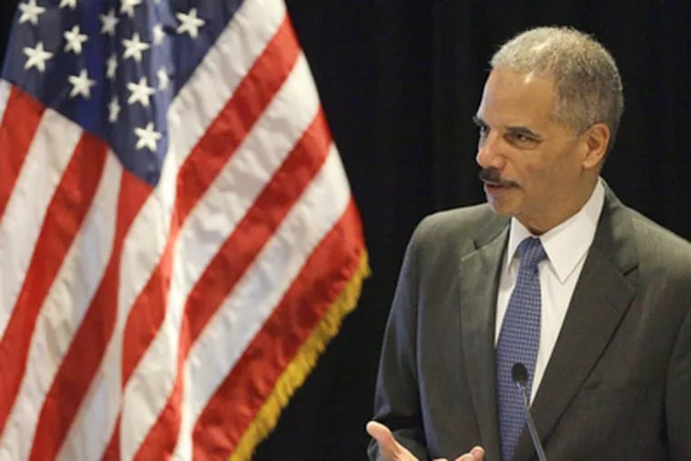 In this photo taken Tuesday, June 26, 2012, Attorney General Eric
Holder speaks in Boston. With a vote looming to hold Holder in
contempt of Congress, a House committee chairman is challenging
President Barack Obama’s claim of executive privilege, invoked to
maintain secrecy for some documents related to a failed gun-tracking
operation.   (AP Photo/Stephan Savoia)
