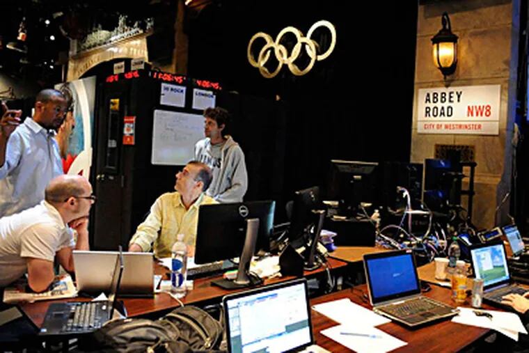 At the converted &quot;Saturday Night Live&quot; studio in New York, NBCUniversal employees create Olympics highlight clips and call competition in sports such as badminton, archery, and handball. VIRGINIA SHERWOOD / NBC