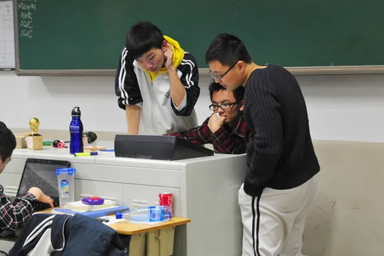 At China's High School Attached to Capital Normal University, the 190 students take Advanced Placement courses taught in English. (Jennifer Lin / Staff)