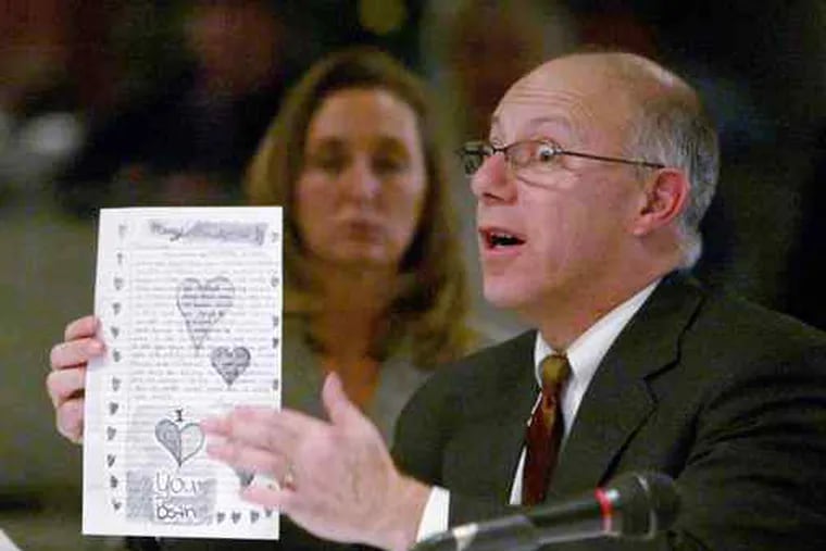 A letter from a juvenile sentenced by ex-Judge Mark A. Ciavarella Jr. is held by lawyer Barry Dyller at a Dec. 8 hearing on an alleged kickback racket.