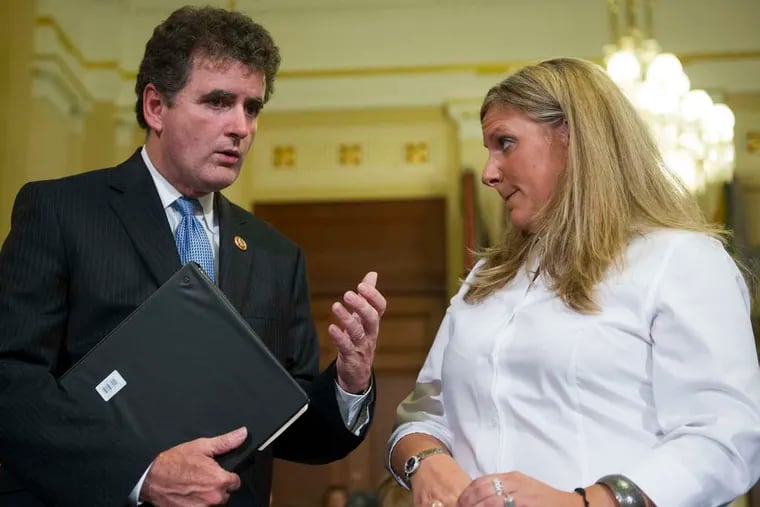 Kristen Ruell of the Philadelphia VA benefits office with Rep. Mike Fitzpatrick (R., Pa.) before she testified in June before a congressional committee. She now says some employees are discouraged by the probes' slow progress.