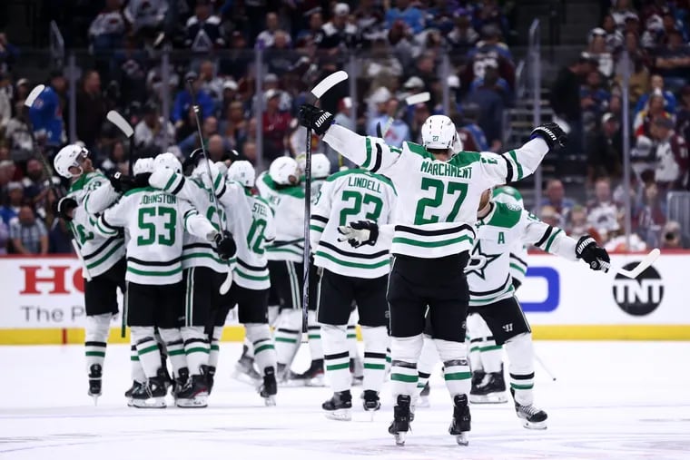 The Dallas Stars celebrate after a 2-1 double-overtime victory against the Colorado Avalanche in Game Six of the Second Round of the 2024 Stanley Cup Playoffs at Ball Arena on May 17, 2024 in Denver, Colorado.  (Photo by Tyler Schank/Clarkson Creative/Getty Images)