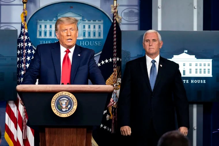 U.S. President Donald Trump, joined by Vice President Mike Pence, at a White House briefing in November.
