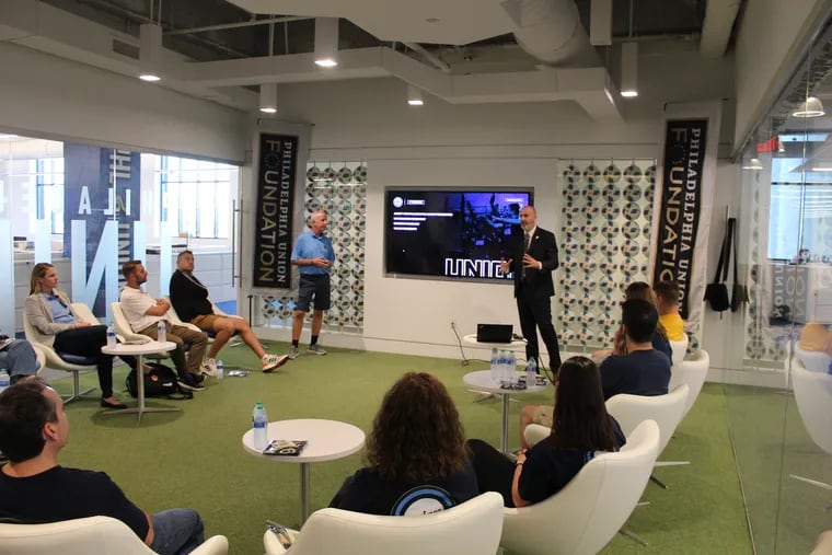 Philadelphia Union Foundation executive director Paul Howard and board member John McClung speak to representatives from Delaware County youth soccer clubs about the foundation's new program to educate young athletes about mental health at the Union's headquarters in Chester last Wednesday.