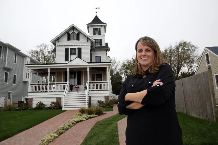 Adrienne Scharnikow stands outside the 1890Õs home she saved from demolition and moved from Avalon to Cape May, NJ, Friday, Oct. 23, 2020.    VERNON OGRODNEK / For The Inquirer
