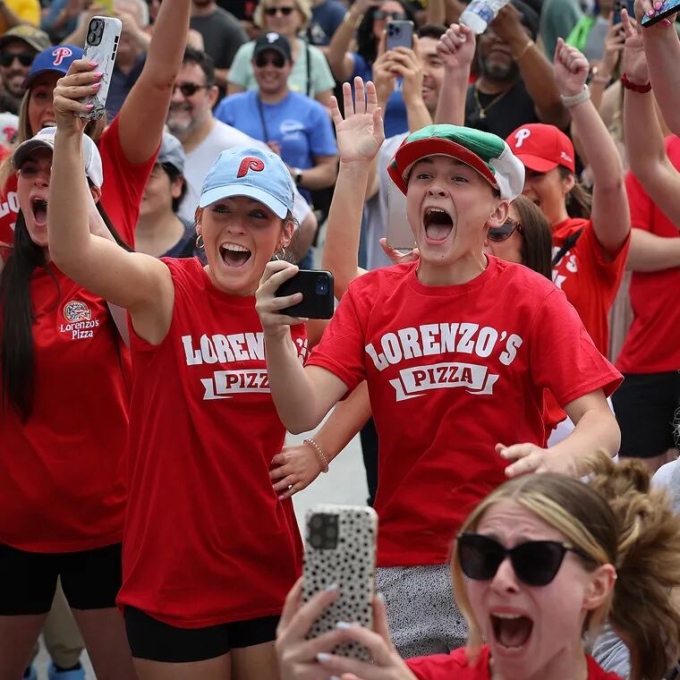 Supporters react as Lorenzo’s wins first place in the hoagie contest during the Italian Market Festival in Philadelphia on Sunday, May 19, 2024.
