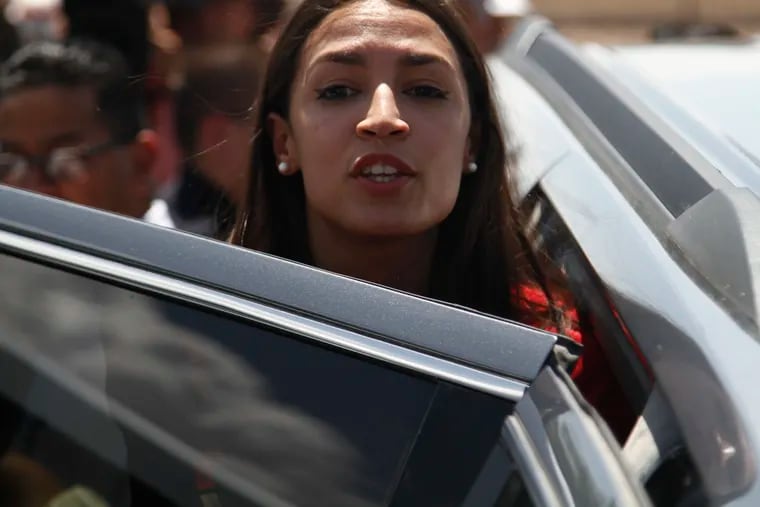 Rep. Alexandria Ocasio-Cortez, of New York, gets in an SUV after touring the inside of the Border Patrol station in Clint, Texas, on Monday.