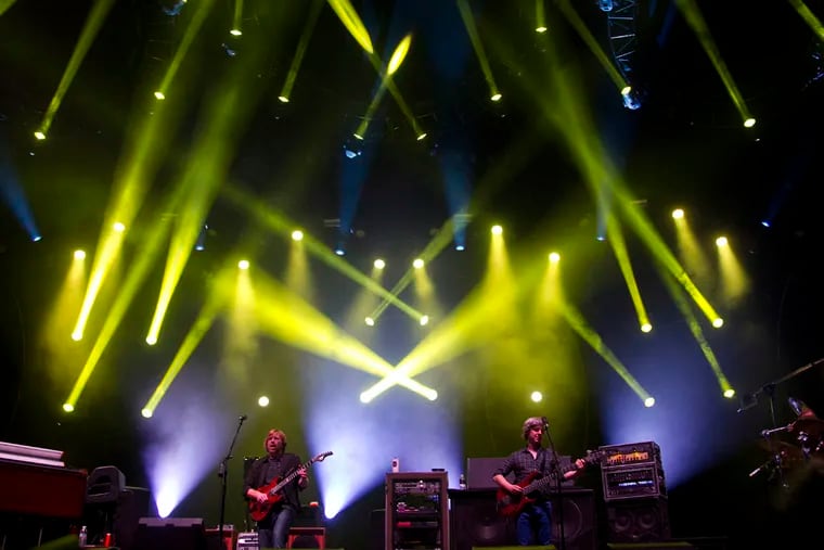 Phish performs during the Bonnaroo Music and Arts Festival in Manchester, Tenn., Sunday, June 10, 2012.