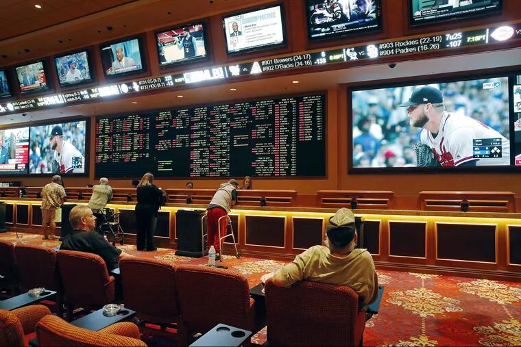 File photo: The sportsbook at the South Point hotel and casino in Las Vegas.  When the Ocean Resort and Hard Rock casinos open on June 28, it appears one will have a sports book and the other will not.