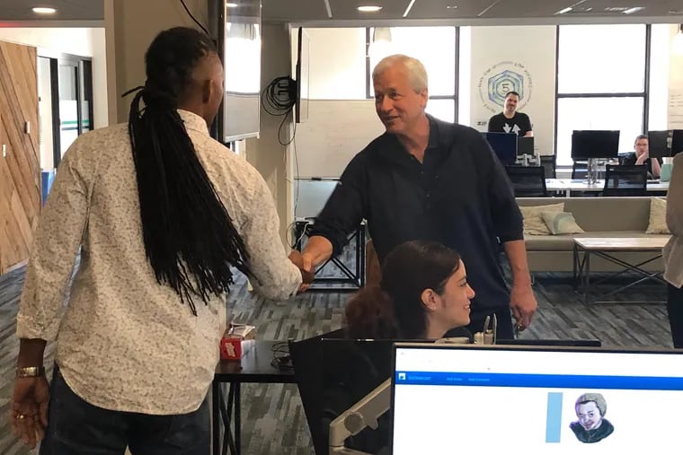 JPMorgan CEO Jamie Dimon meets trainers and students at Zip Code Wilmington, a coding school in the city. Many of the grads go on to work as software engineers in banks and financial institutions in Delaware.