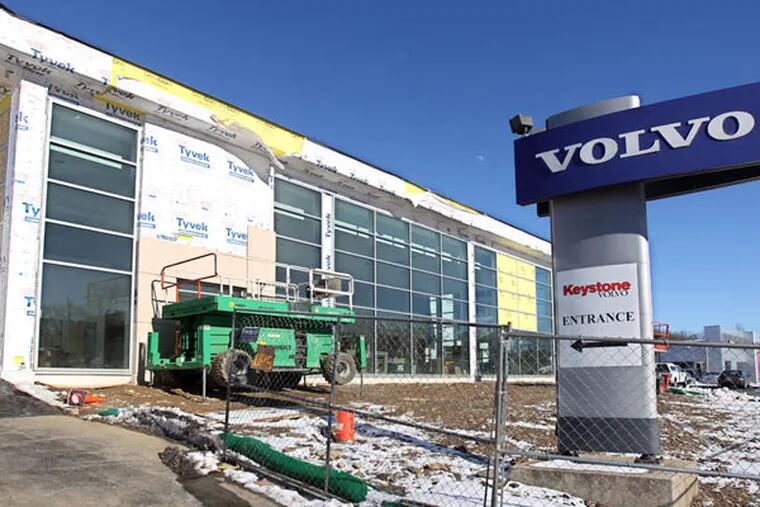 Amid strong car sales, dealers rebuild the showroom