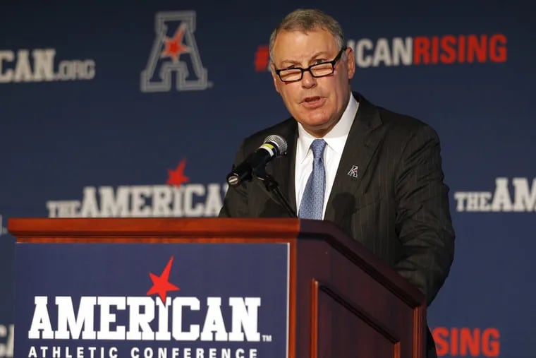 American Athletic Conference commissioner Mike Aresco, shown in 2015, said Temple and Miami will play in football, but nothing is official yet.