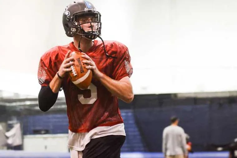 Philadelphia Soul quarterback Dan Raudabaugh drops back to pass during practice at the teams facilities in Voorhees, New Jersey on Thursday, July 31, 2014.