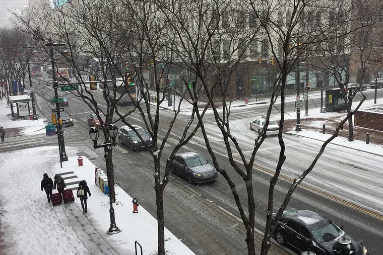 Snow and slush is creating headaches on Market Street in Philadelphia.