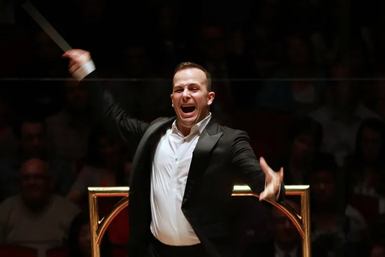 Music Director Yannick Nézet-Séguin conducts the Philadelphia Orchestra in a January 2014 concert at the Kimmel Center. (David Swanson/Staff Photographer)